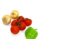 Onions, tomatoes on a branch and green pepper on a white background