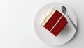 White Background Featuring A Top-Down Perspective Of A Decadent Red Velvet Cake Slice Served With A Royalty Free Stock Photo