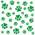 Dog paw.White background and green dog tracks. Pattern with traces. Royalty Free Stock Photo