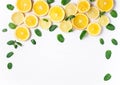 Photo of orange and lemon slices with mint on a white background. Background for the design of banners, websites, blogs, Royalty Free Stock Photo