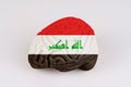 On a white background, a model of the brain with a picture of a flag - Iraq