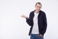 On a white background an ordinary young man in a white T-shirt, Royalty Free Stock Photo