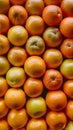 Abundant bunch of vibrant orange fruits arranged attractively