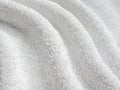 White background of towel texture. Macro photo of terry cloth.