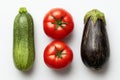On a white background, zucchini and eggplant are pictured separately, as is fresh vegetable marrow, and in a separate image Royalty Free Stock Photo