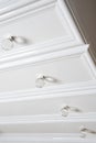 White badroom shelf with rounded handles