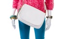 White bag and pink pullover.