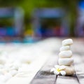 White balanced stones and white plumeria near Royalty Free Stock Photo