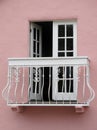 White Balcony on a pink house. Monterey, California, USA 