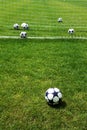 White ball on football soccer turf field green grass background Royalty Free Stock Photo