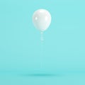 White Balloon floating on blue background