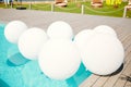 White balloons in the pool with clear water Royalty Free Stock Photo