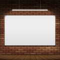 White banner hanging on a red brick wall. Royalty Free Stock Photo