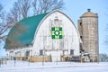 White Barn with Green Quilt and Silo, Winter Royalty Free Stock Photo