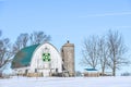 White Barn with Green Quilt and Silo, Winter Royalty Free Stock Photo