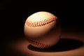 White baseball on dark background Royalty Free Stock Photo