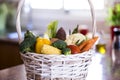 White basket full of different kind of fresh vegetables. Healthy eating concept and detox diet. Vegan and vegetarian food Royalty Free Stock Photo