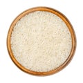 White Basmati rice, aromatic long grain rice in wooden bowl Royalty Free Stock Photo