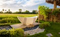 white bath tub outside on vacation at a homestay in Thailand with green rice paddy field Royalty Free Stock Photo