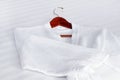 White bathrobe on the bed Royalty Free Stock Photo