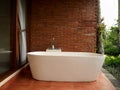 white bathroom brick wall brown tiles interior design fresh air nature Royalty Free Stock Photo