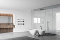 White bathroom corner with tub, sink and shower Royalty Free Stock Photo