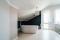 White bathroom in modern house stands in master bedroom Royalty Free Stock Photo