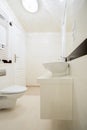 White bathroom in modern house Royalty Free Stock Photo