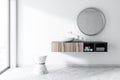 White bathroom with a round sink, mirror Royalty Free Stock Photo