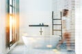 White bathroom with tub and ladder, woman Royalty Free Stock Photo