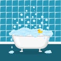 White bathtub with foam, bubbles and yellow duck Royalty Free Stock Photo