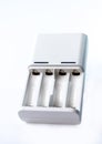 White battery charger for 1.5V batteries, size AA and AAA