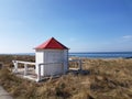 white beach hut at dune landscape Royalty Free Stock Photo