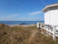 white beach hut at dune landscape Royalty Free Stock Photo