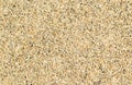 White beach sand photo for background. Tropical beach with golden sand. Royalty Free Stock Photo