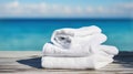 White beach towels on wood over blurred blue sea background, Generative AI Royalty Free Stock Photo