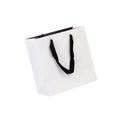 White beamless paper-bag with cords. Royalty Free Stock Photo