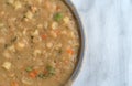 White bean soup in a bowl on a marble table Royalty Free Stock Photo