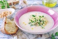 White bean vegetarian cream soup with fried pearl barley and parsley Royalty Free Stock Photo