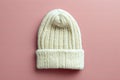 White beanie mockup, solid color background, flat lay, front view Royalty Free Stock Photo