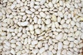 White beans, haricot beans background, top view. Various dried legume beans for background. Wallpaper of white ripe beans. Healthy Royalty Free Stock Photo