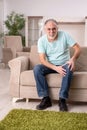 The white bearded old man suffering at home Royalty Free Stock Photo