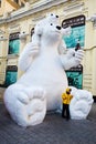 White bears (snow sculpture) and boy