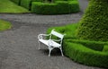 White beautiful bench lonely standing in a spring park