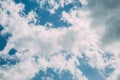 white beautiful fluffy clouds on a blue sky