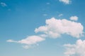 White beautiful fluffy clouds on a blue clear sky, Royalty Free Stock Photo