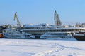 White beautiful passenger ship in frozen river