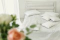 White bed in beddrom with pillows close up photo Royalty Free Stock Photo