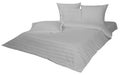 White bed linen set, satin, strip. blanking sample Royalty Free Stock Photo