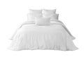 White bed with pillows an duvet isolated Royalty Free Stock Photo